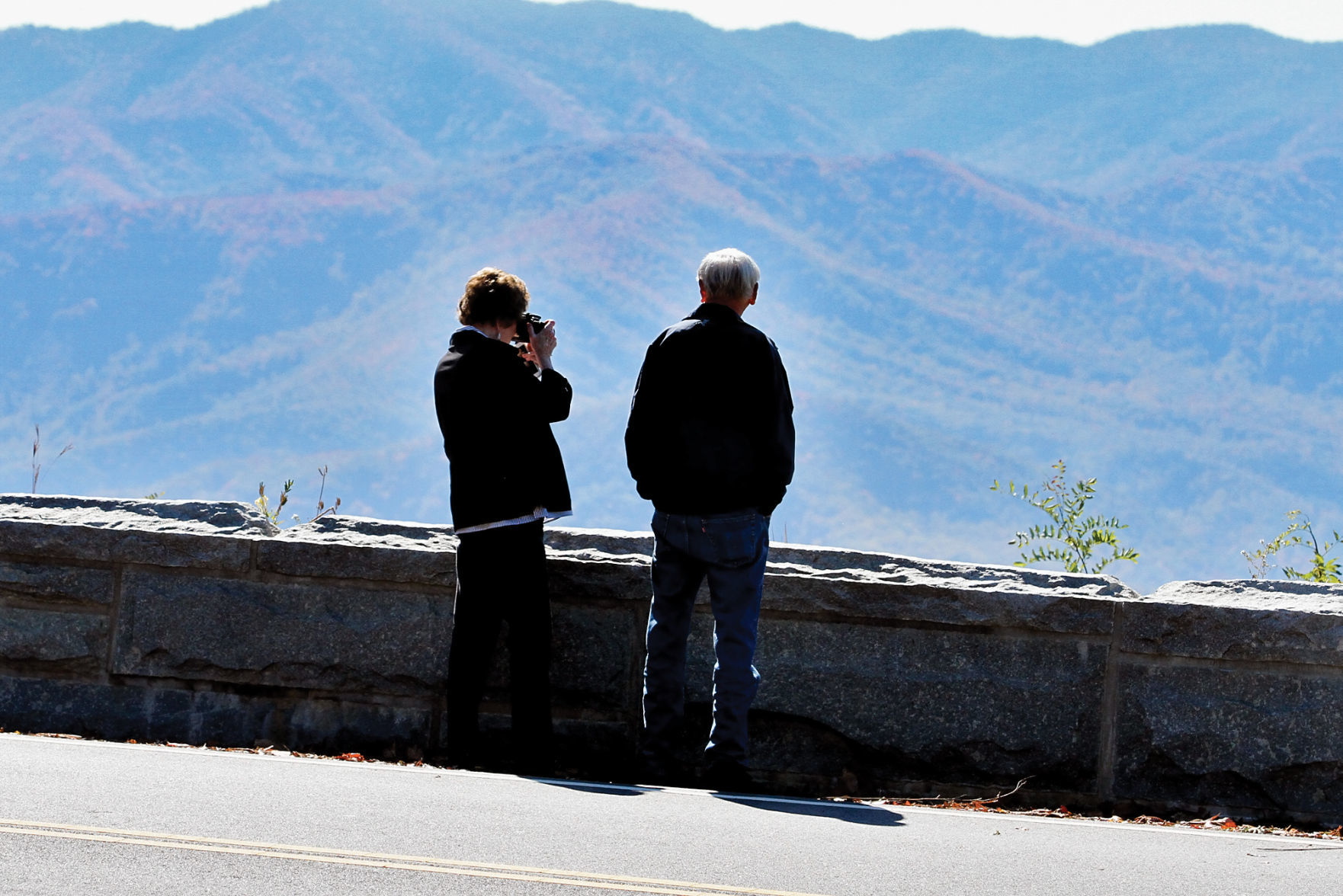 Visitors along the Foothills Parkway stop to take photos of the scenery